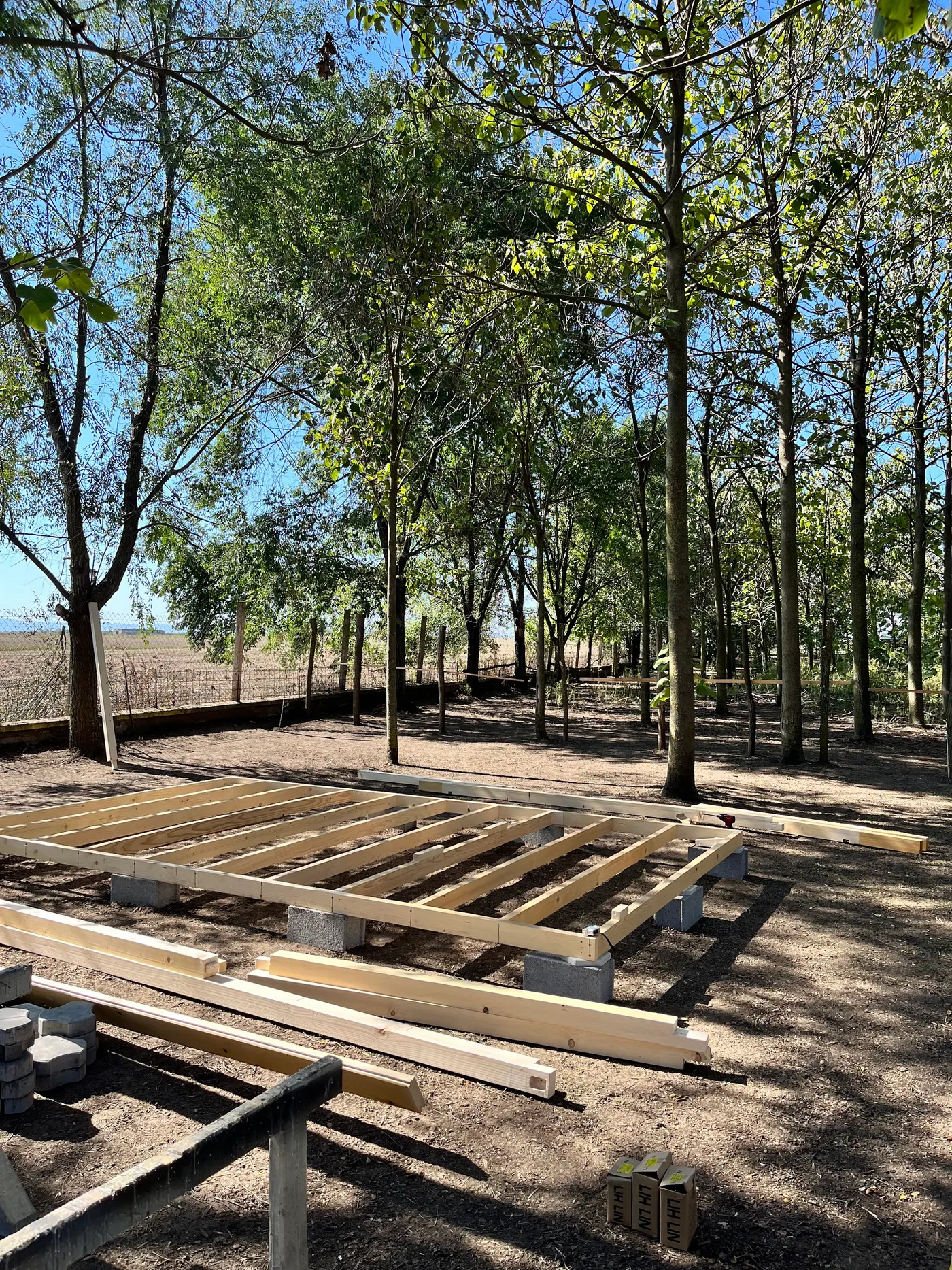 bright wooden garden cabin under trees after construction - Zmajevo - frame 3