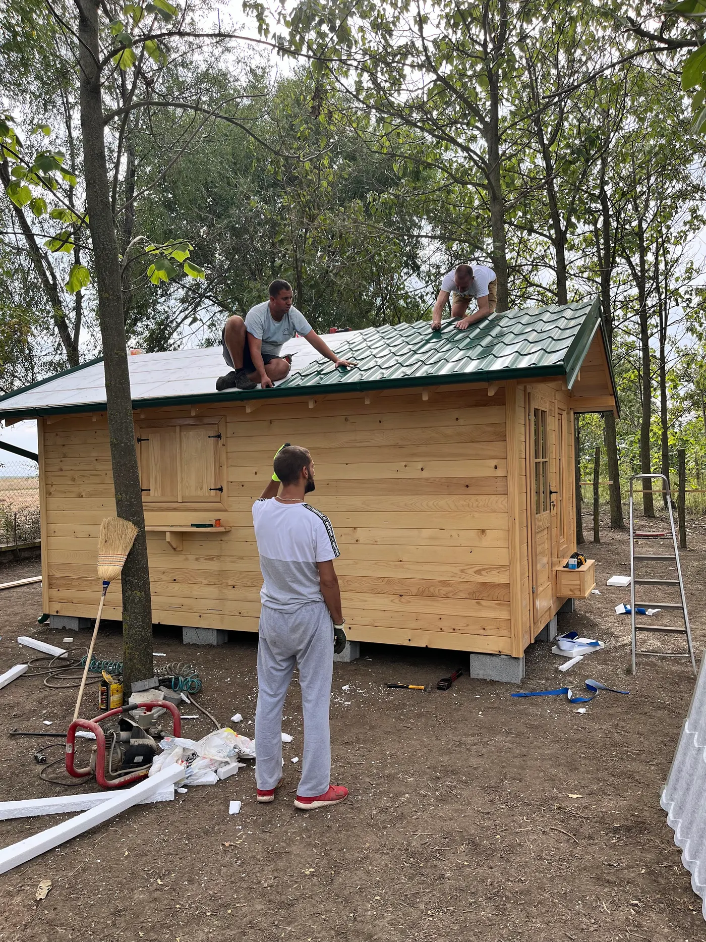 bright wooden garden cabin under trees after construction - Zmajevo - frame 26
