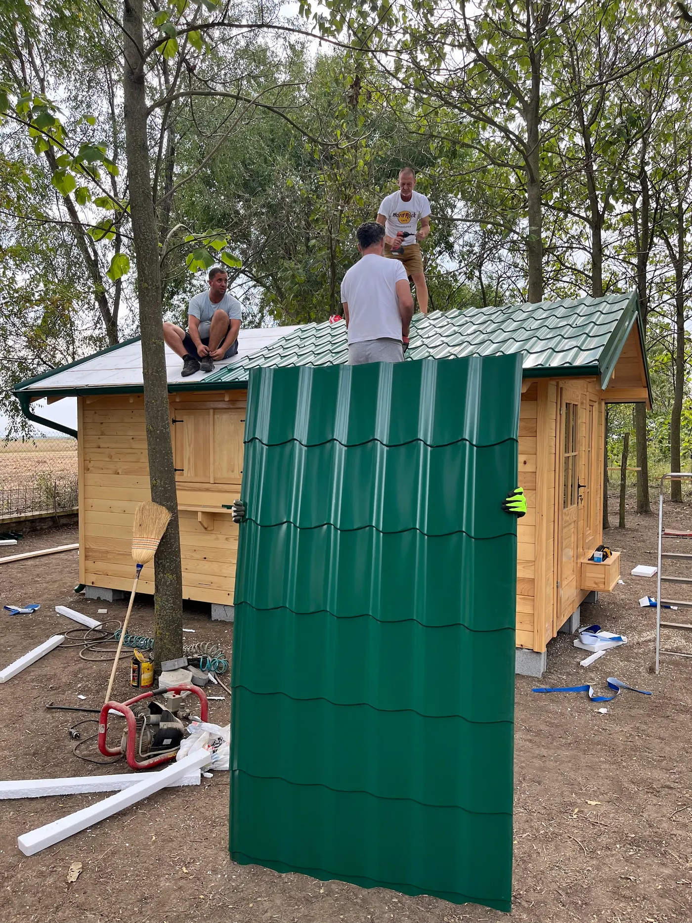 bright wooden garden cabin under trees after construction - Zmajevo - frame 27