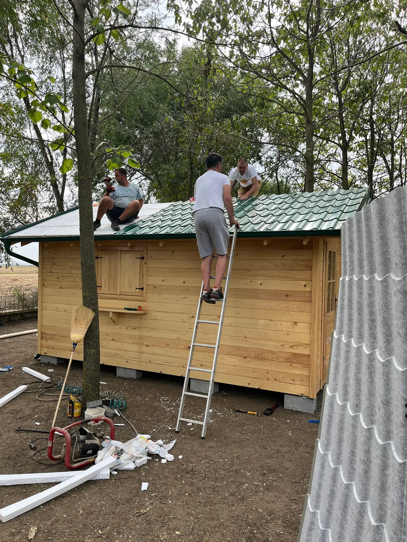 bright wooden garden cabin under trees after construction - Zmajevo - frame 28