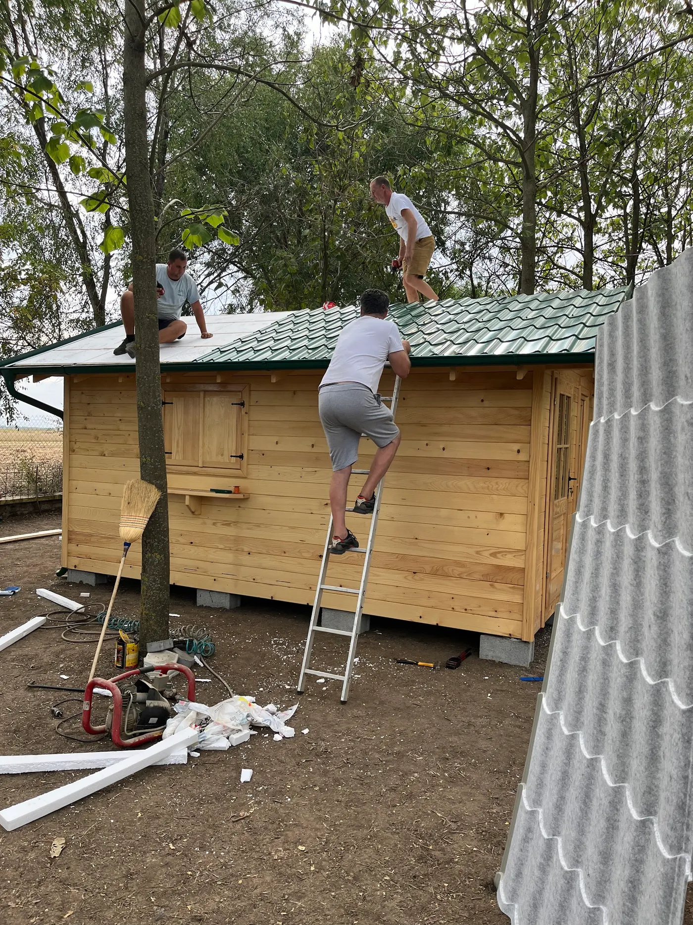 bright wooden garden cabin under trees after construction - Zmajevo - frame 29