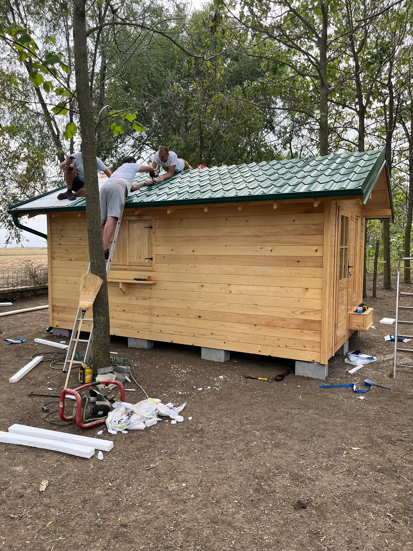 bright wooden garden cabin under trees after construction - Zmajevo - frame 30