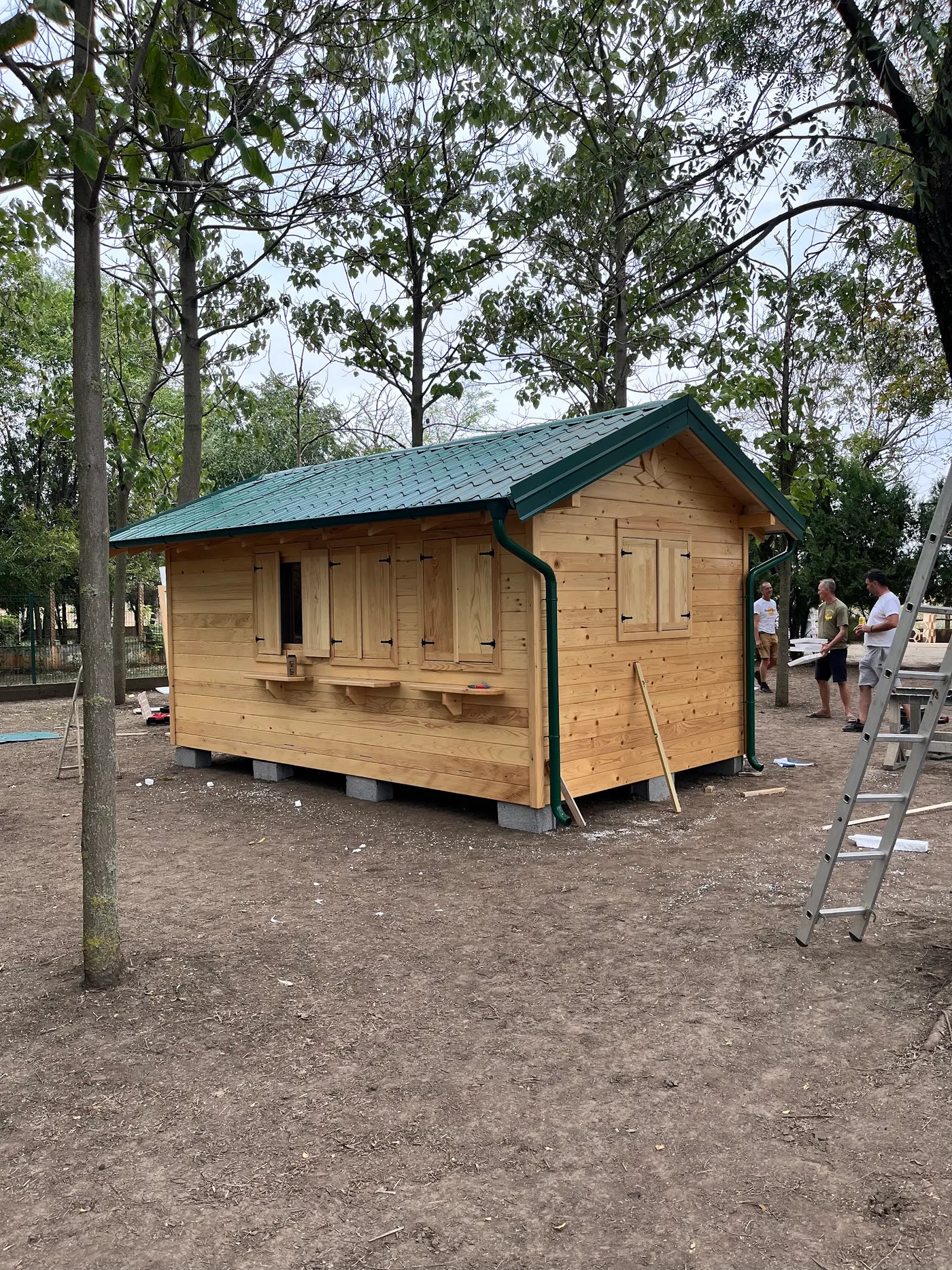bright wooden garden cabin under trees after construction - Zmajevo - frame 32
