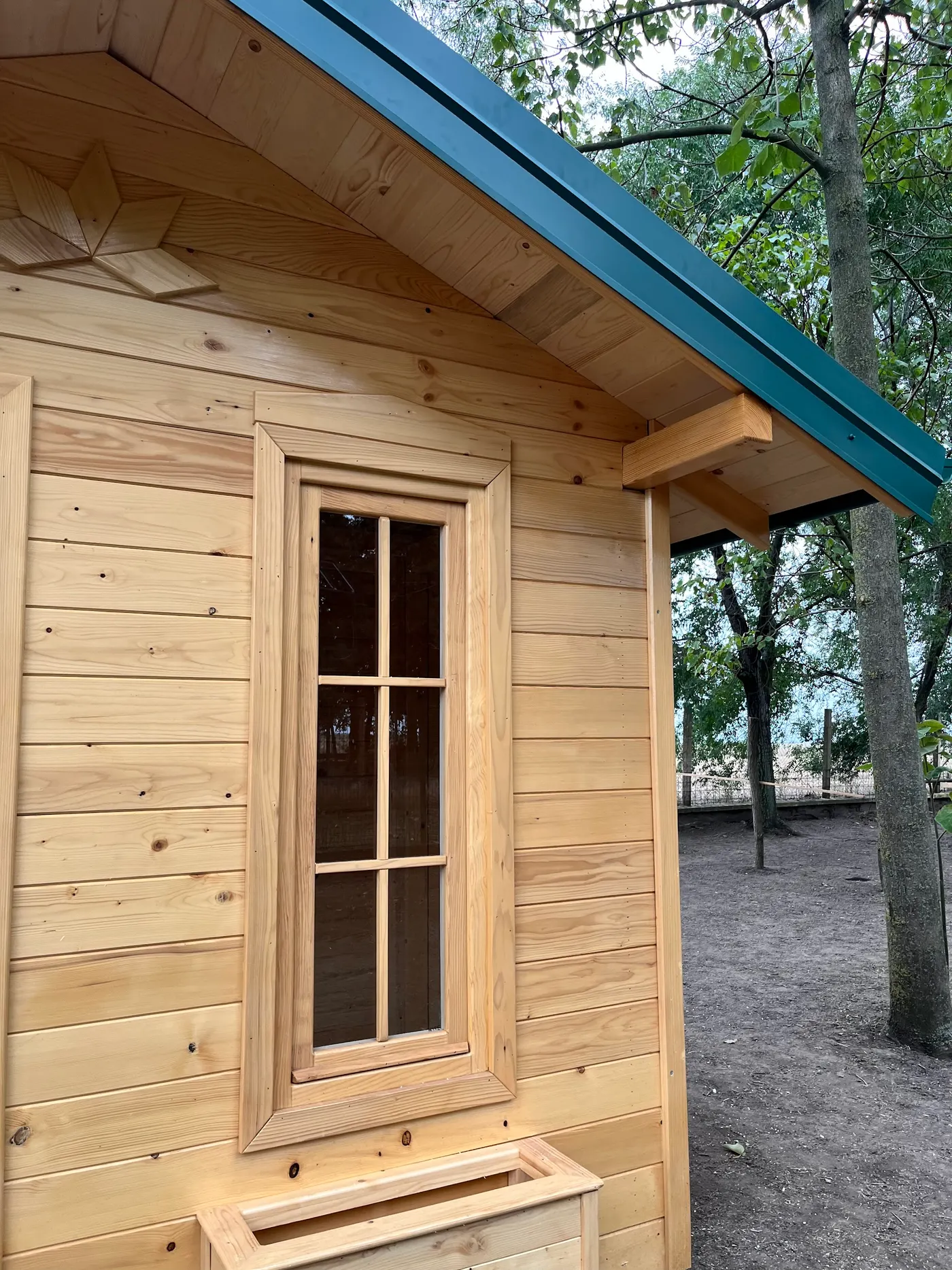 bright wooden garden cabin under trees after construction - Zmajevo - frame 34