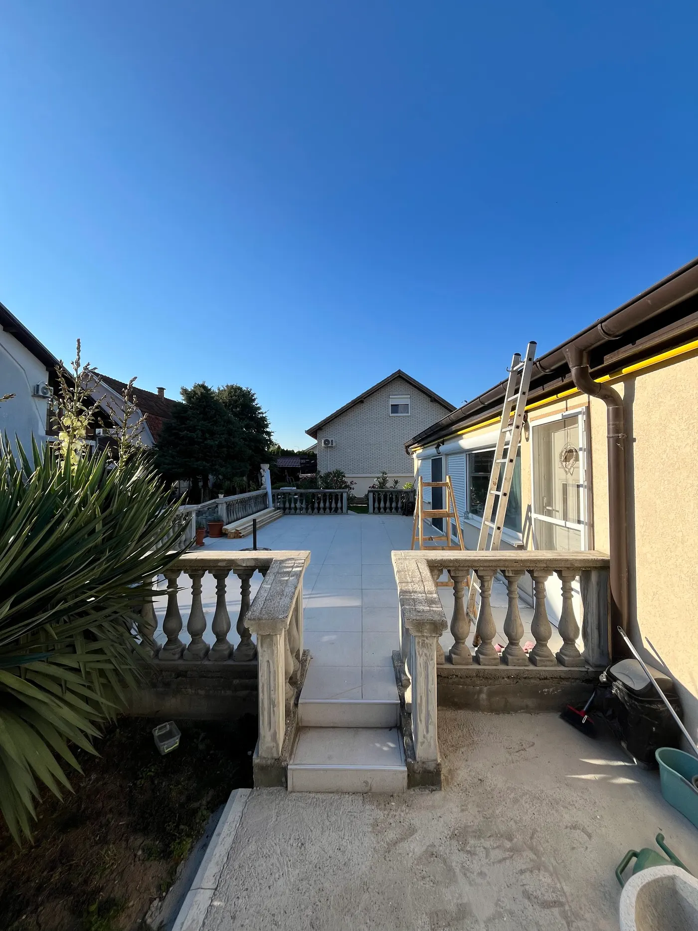 finished wooden canopy in a tidy backyard - frame 8