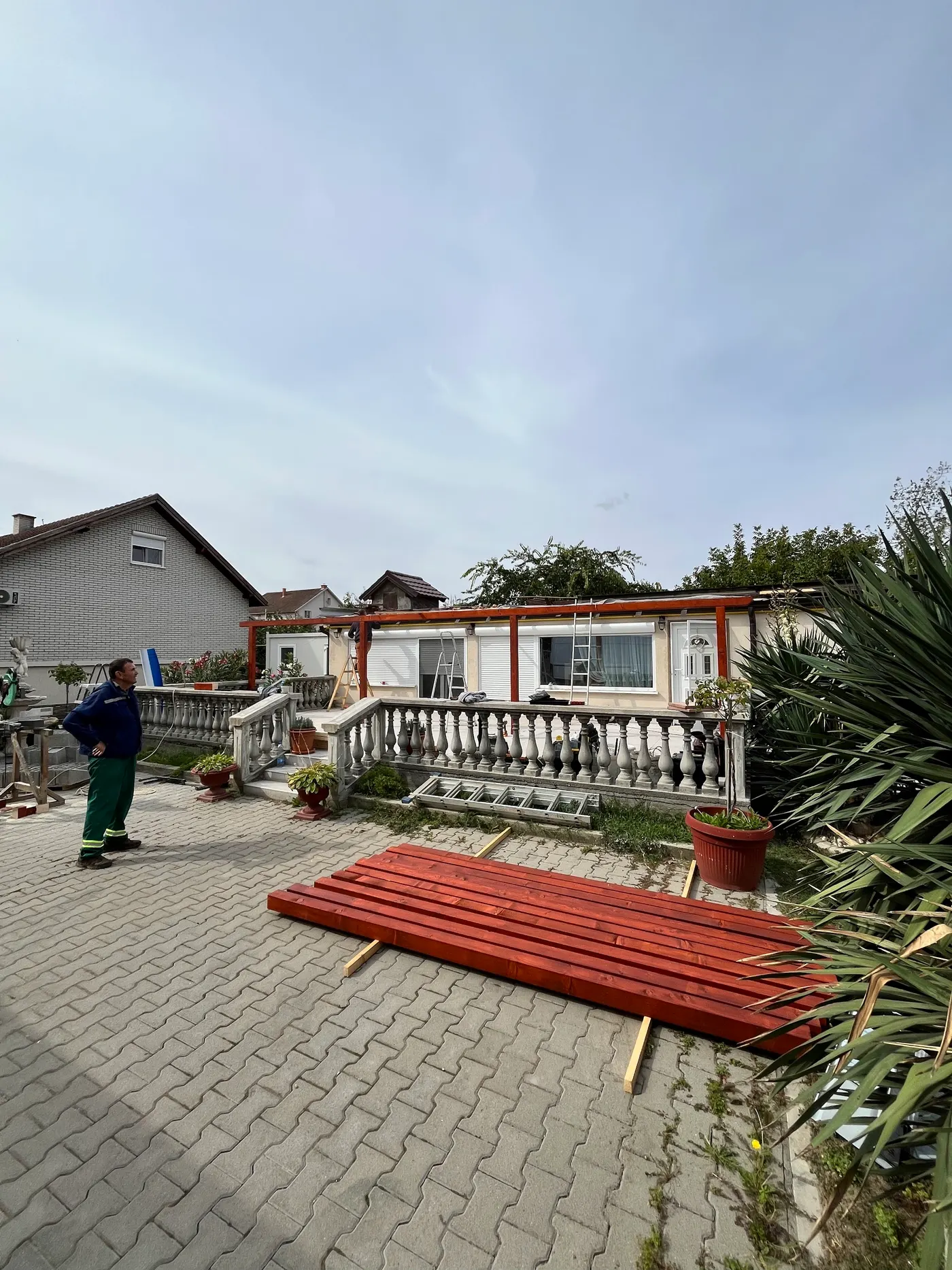 finished wooden canopy in a tidy backyard - frame 10