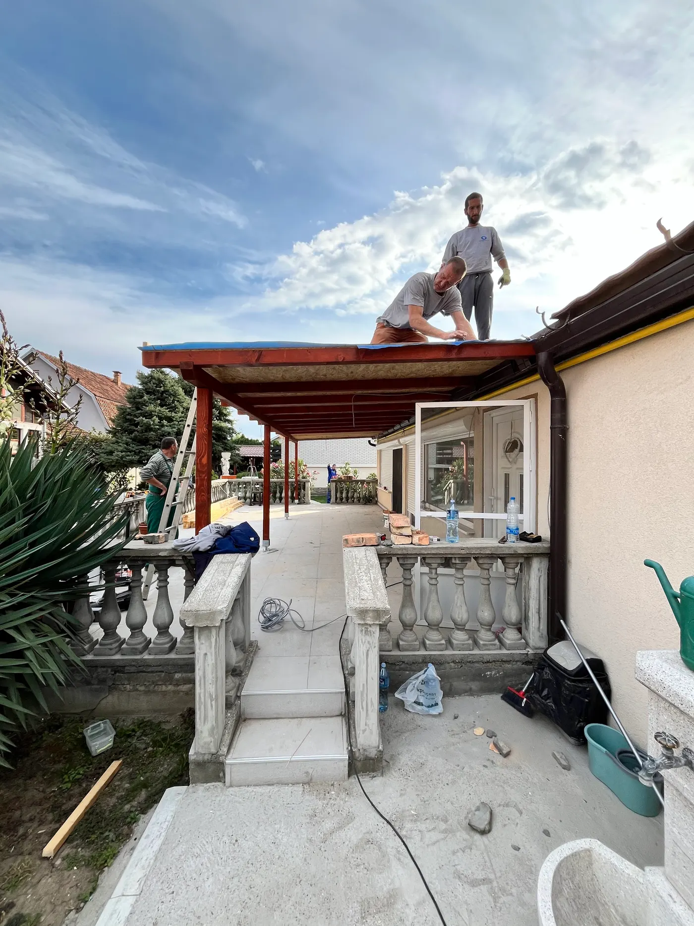 finished wooden canopy in a tidy backyard - frame 17