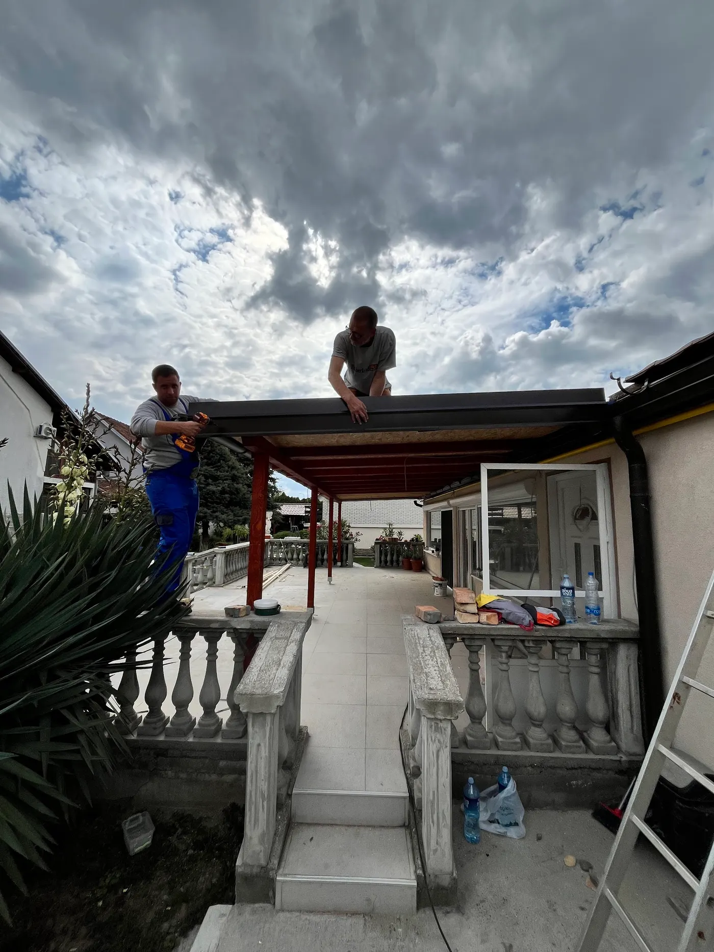 finished wooden canopy in a tidy backyard - frame 22